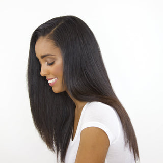 image of model with sleek shiny hair styled by the beachwaver® coast pro.