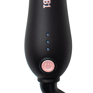 Up Close Image of Black and Rose Gold Beachwaver B1s power button and 3 heat buttons 