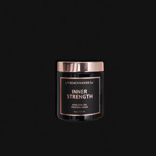 image of Inner Strength Avocado Oil Protein Mask on a black background.