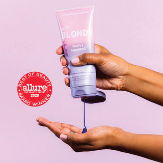 image of Beachwavers BRB Blonde Purple Shampoo getting squeezed out into someones hand with the "Allure Best of Beauty" stamp on it.