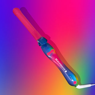 Image of Beachwaver® Baked By Melissa B1 Curling Iron on a rainbow background.