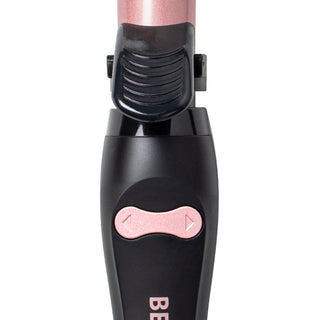 Up Close Image of Black and Rose Gold Beachwaver B1s rotating buttons.