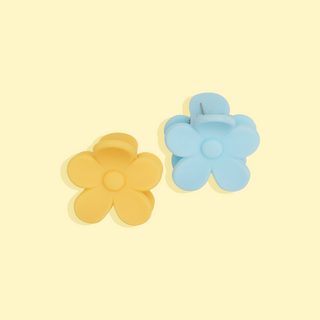 Image of blue and yellow daisy clip on yellow background