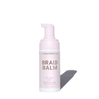 Image of pink Foam pump bottle of Braid Balm Pre-braid prep.