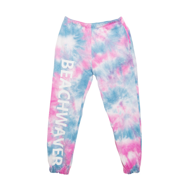 Image of pink and blue tie-dye Sweatpants with a white Beachwaver logo going down the leg