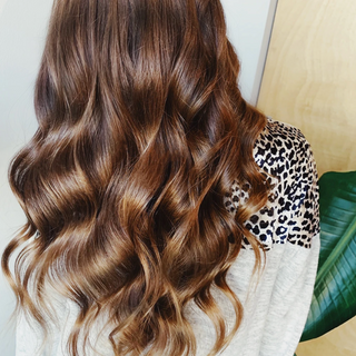Image of Brunette Hair styled by a Beachwaver B1 Curling Iron.