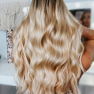 Image with long blonde hair styled into long waves with the Beachwaver S1.