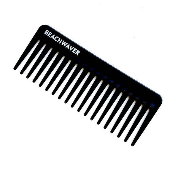Image of black wide tooth comb with white Beachwaver logo on white background.